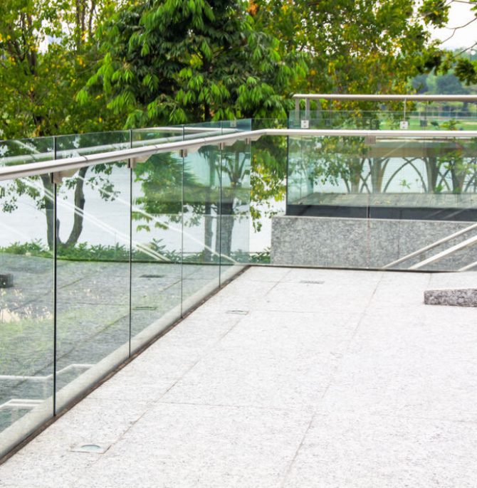 Unstable Balustrades Along Contemporary Glass Terrace Overlooking Nature
